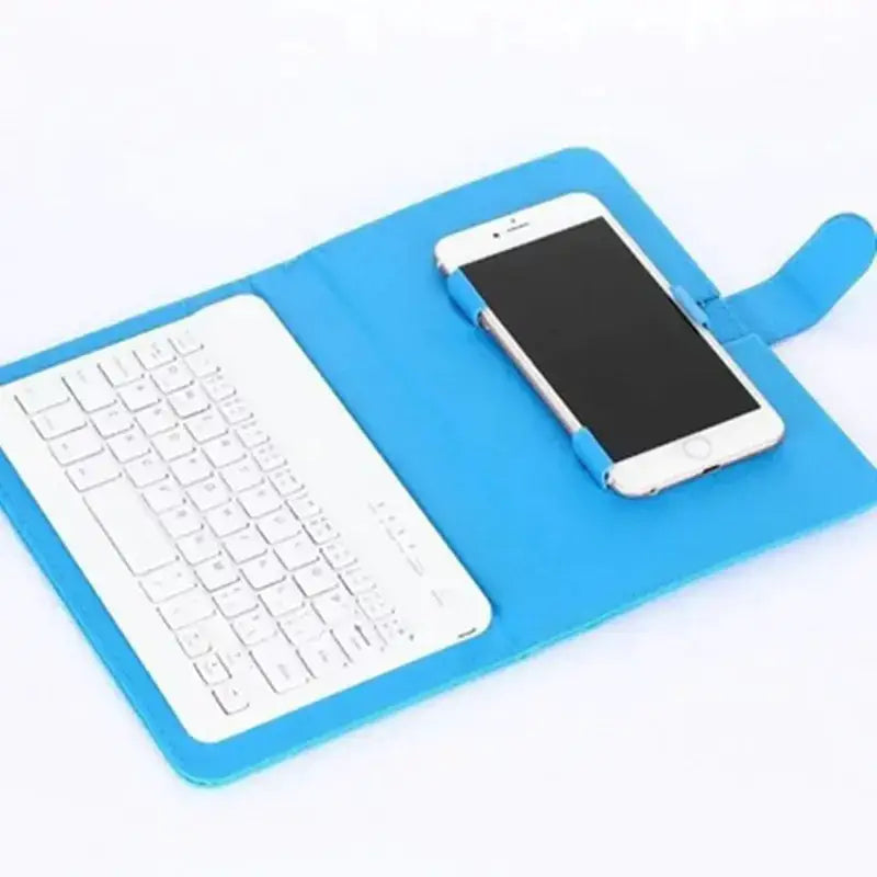Blue leather phone case with integrated white wireless keyboard