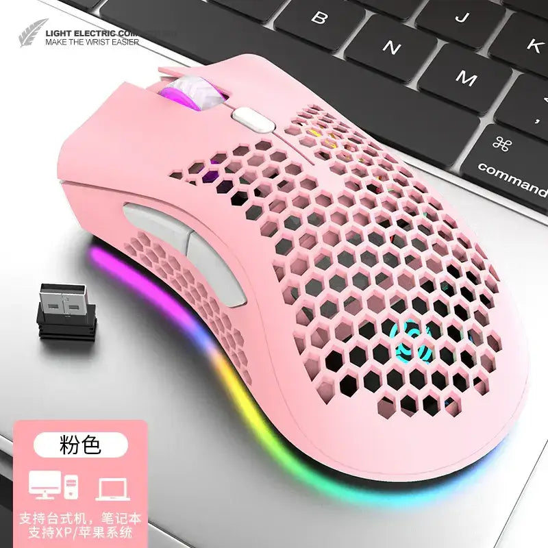 Pink wireless gaming mouse with honeycomb ventilation design and rgb lighting.