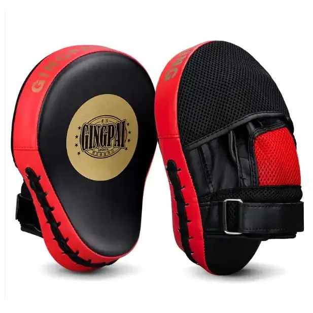 Red and black boxing punch mitts with a gold logo on the front.