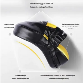 Black and yellow boxing pad with a composite liner, raised palm grip design, curved shape for skill practice, thickened sponge cushion at the wrist, and breathable back panel.