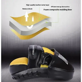 Black and yellow boxing punch mitt with a high-quality leather outer layer and foam composite molding liner.