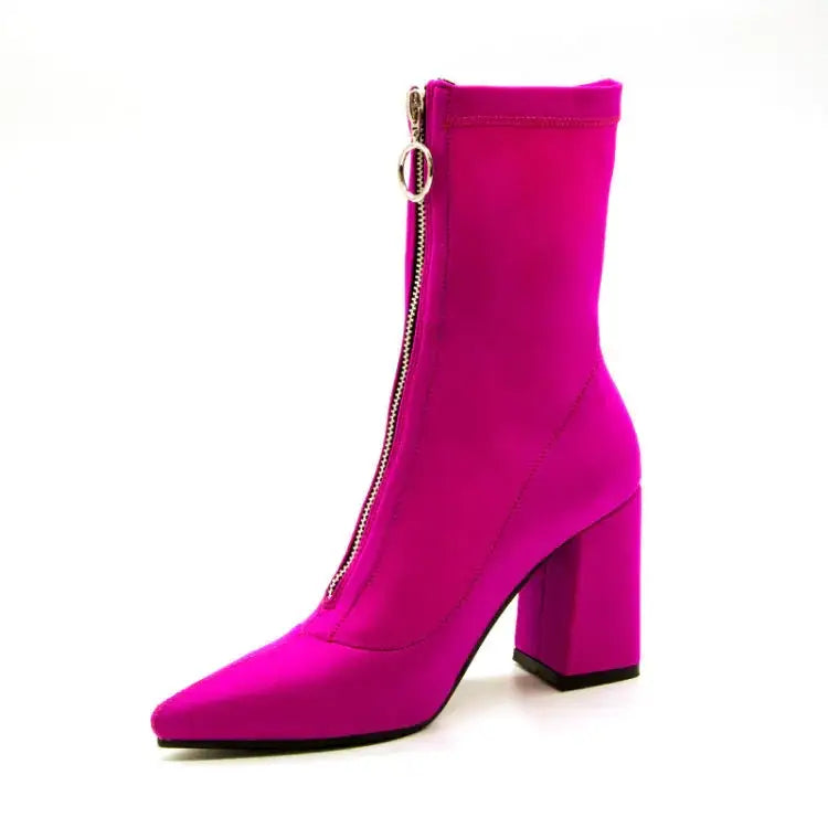Vibrant fuchsia satin ankle boot with a chunky heel and front zipper closure.