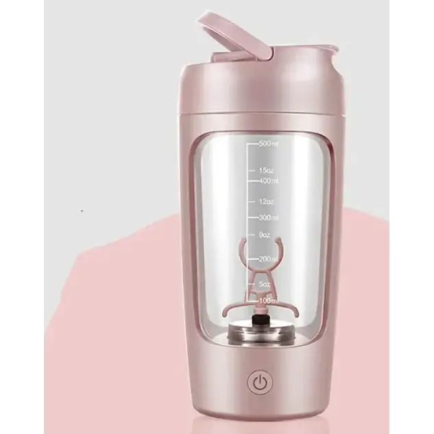 Rose gold wireless blender shaker with transparent body and measurement markings.
