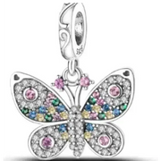 A silver butterfly charm adorned with colorful gemstones and intricate detailing.
