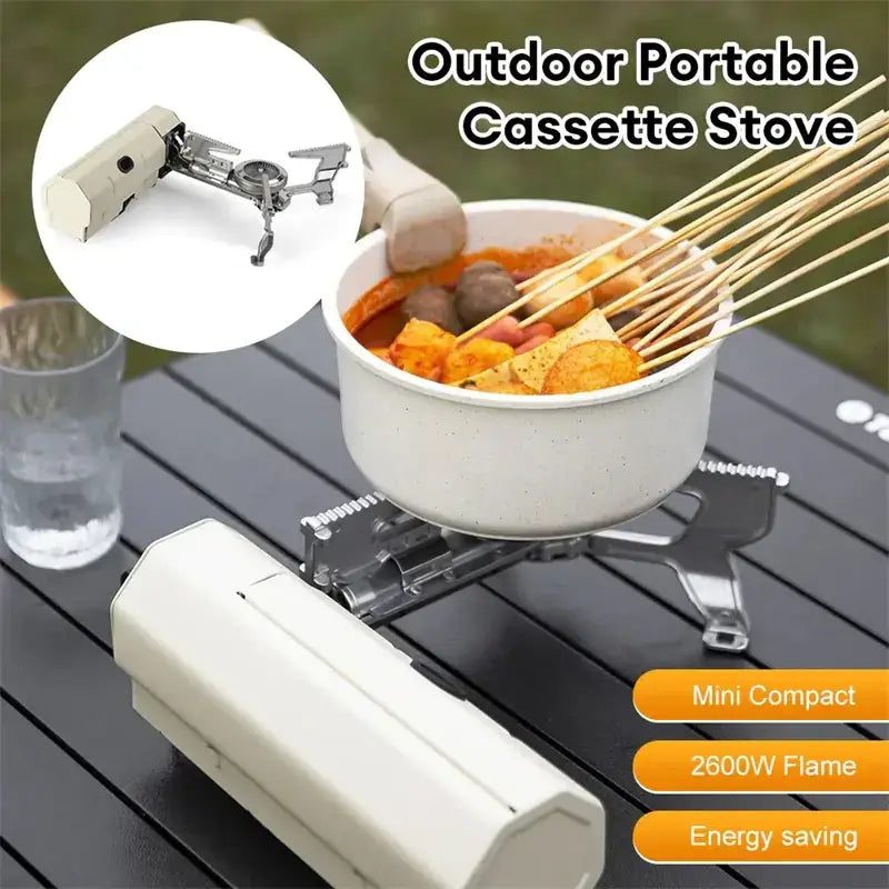 White portable cassette stove with metallic burner assembly