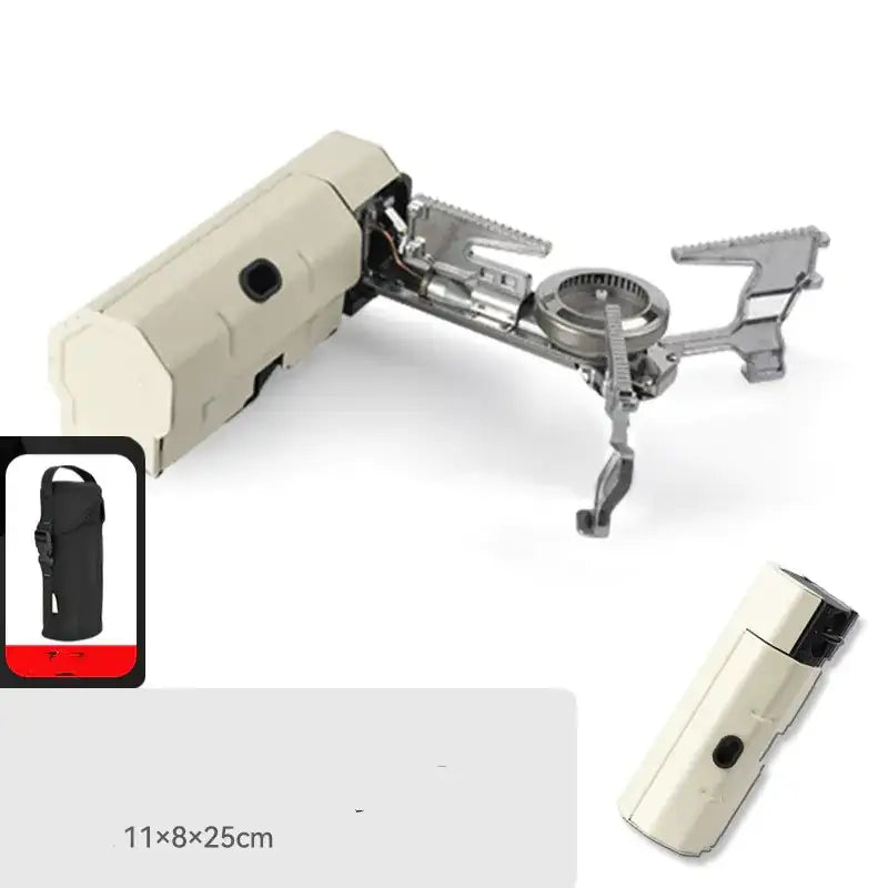 Beige and silver portable camping stove with foldable legs, fuel tank, burner assembly, and a matching cylindrical carrying case.