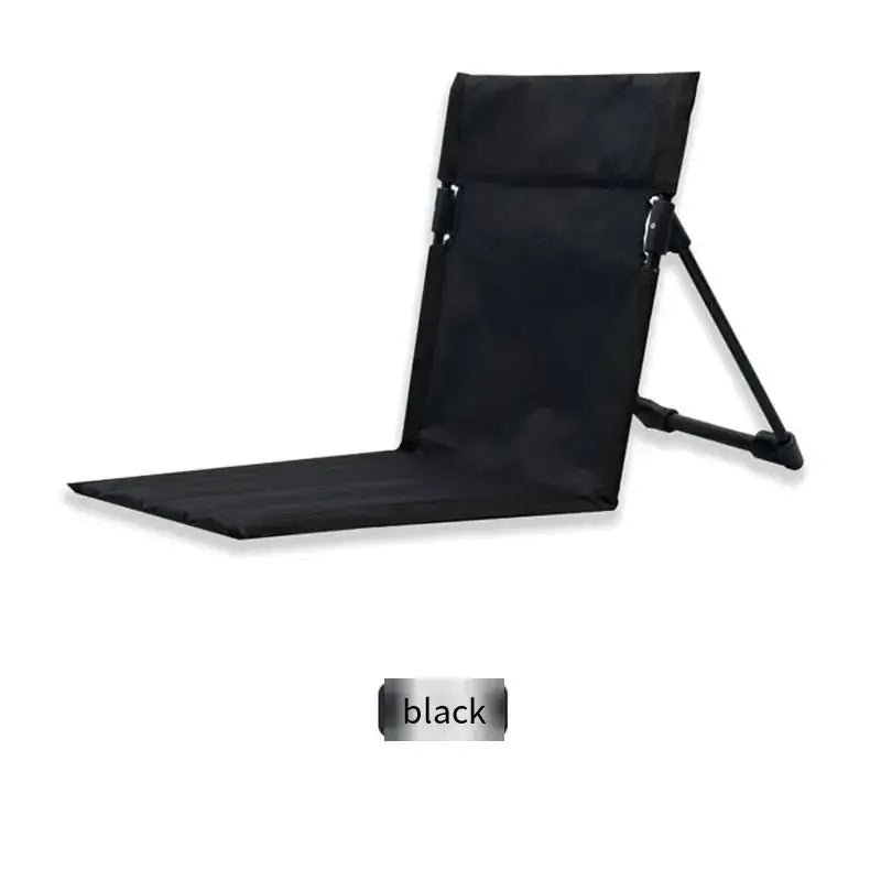 Black foldable camping chair with a padded seat and backrest supported by adjustable metal legs.