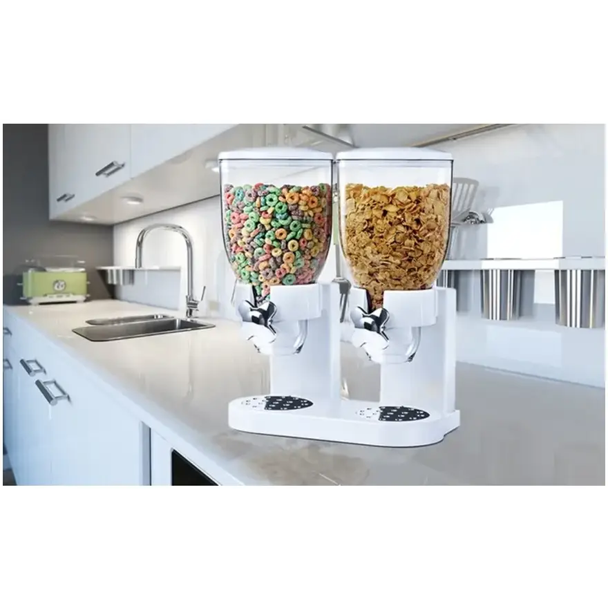 White dual-cereal dispenser with clear plastic containers holding colorful cereal loops and golden flakes.