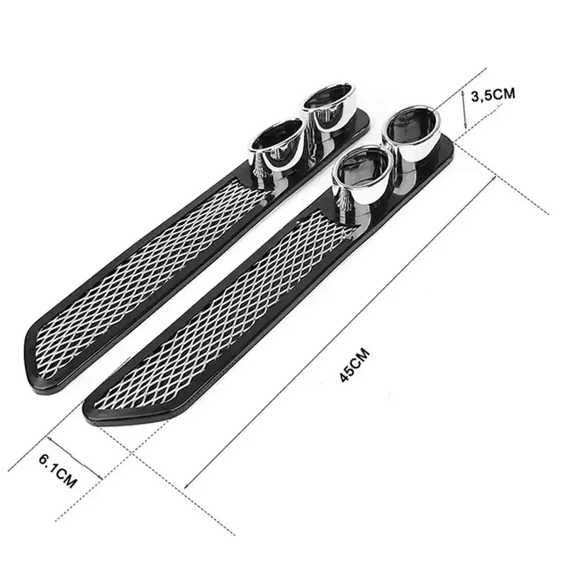 Black mesh car side skirt trim with chrome exhaust pipe accents.