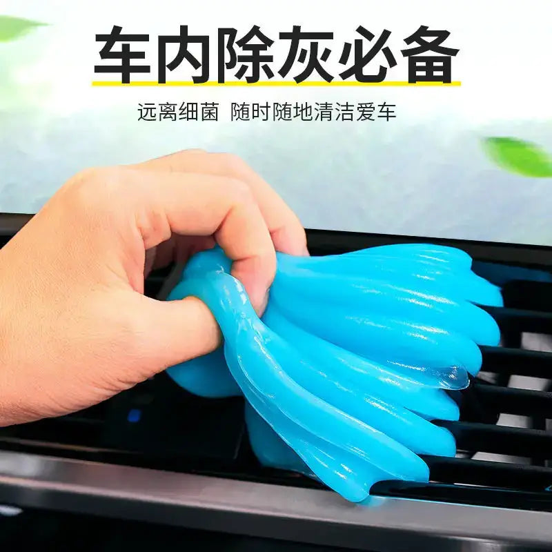 Bright blue, flexible silicone car air vent cleaner with a fanned-out design for easy dust removal.