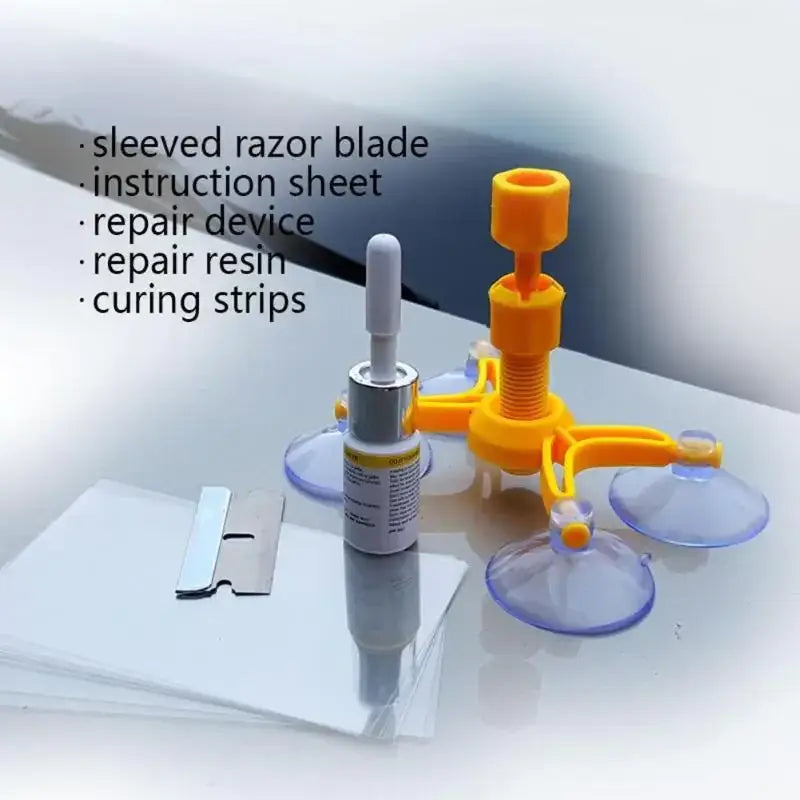 Yellow suction cup repair device with a central threaded knob and four transparent cups
