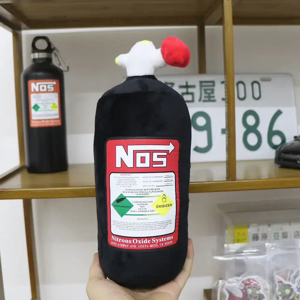 Black plush nos nitrous oxide tank with a white and red stuffed chicken head on top.