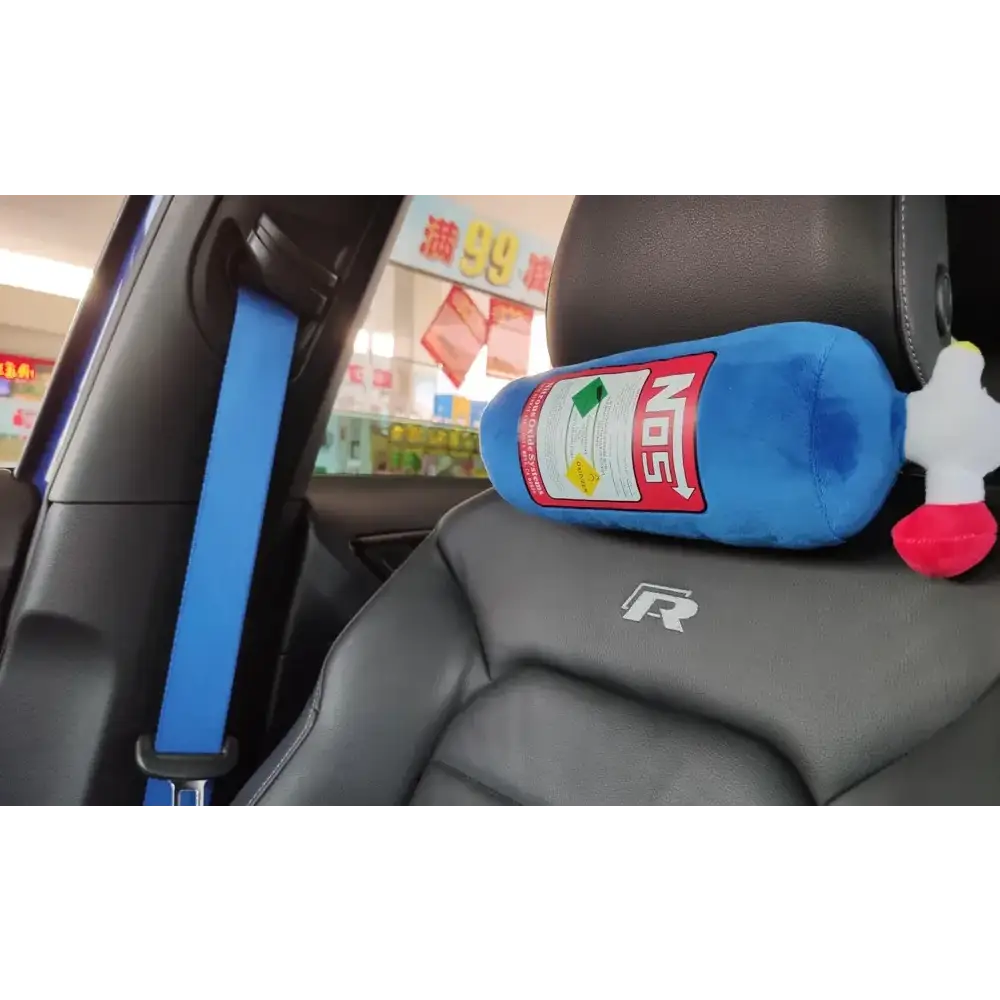 Blue plush toy shaped like a gas canister with a red label and white nozzle.