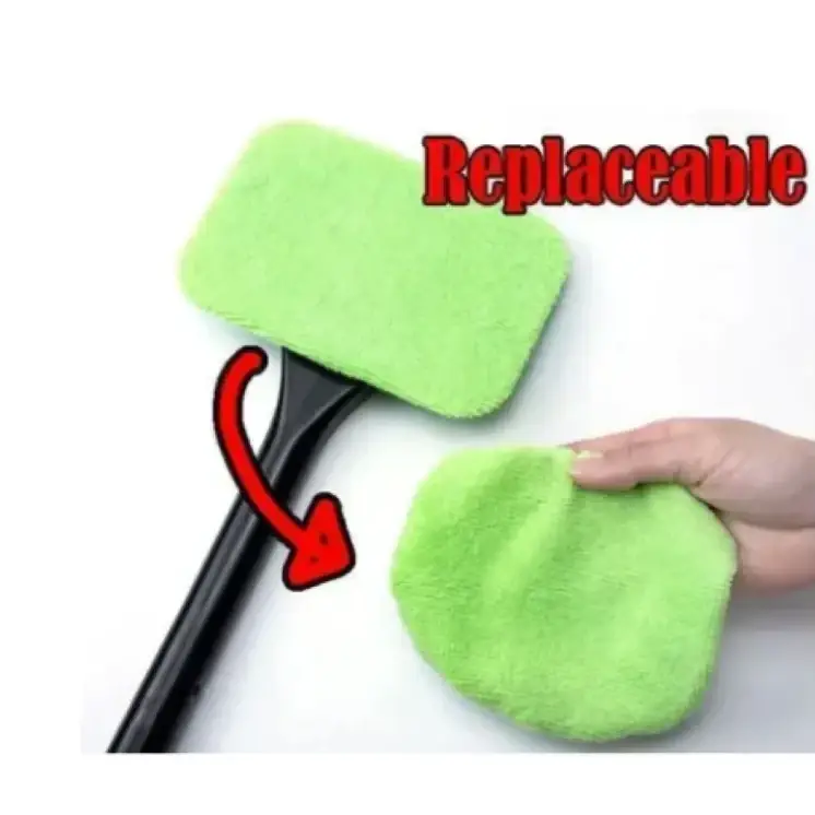 Bright green, plush microfiber cleaning pad designed for easy replacement on a black handle.
