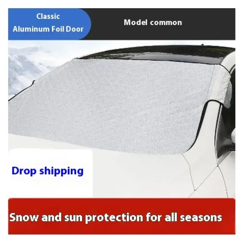 Silver aluminum foil windshield cover for cars, designed to protect against snow and sun year-round.