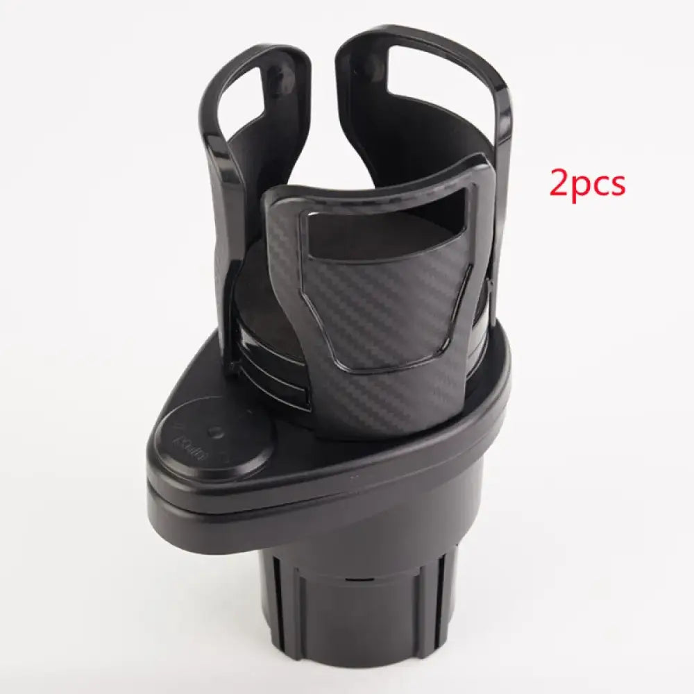 Black plastic car cup holder with carbon fiber textured grip and adjustable arms.