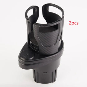 Black plastic car cup holder with carbon fiber textured grip and adjustable arms.