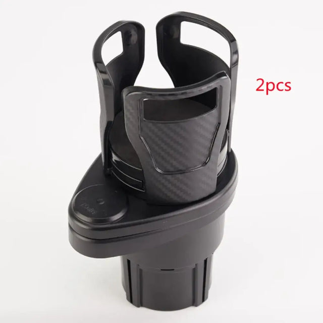 Black plastic car cup holder with carbon fiber textured grip and adjustable arms.