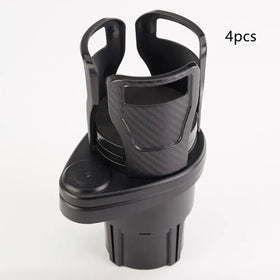 Black plastic car cup holder with a carbon fiber patterned insert.