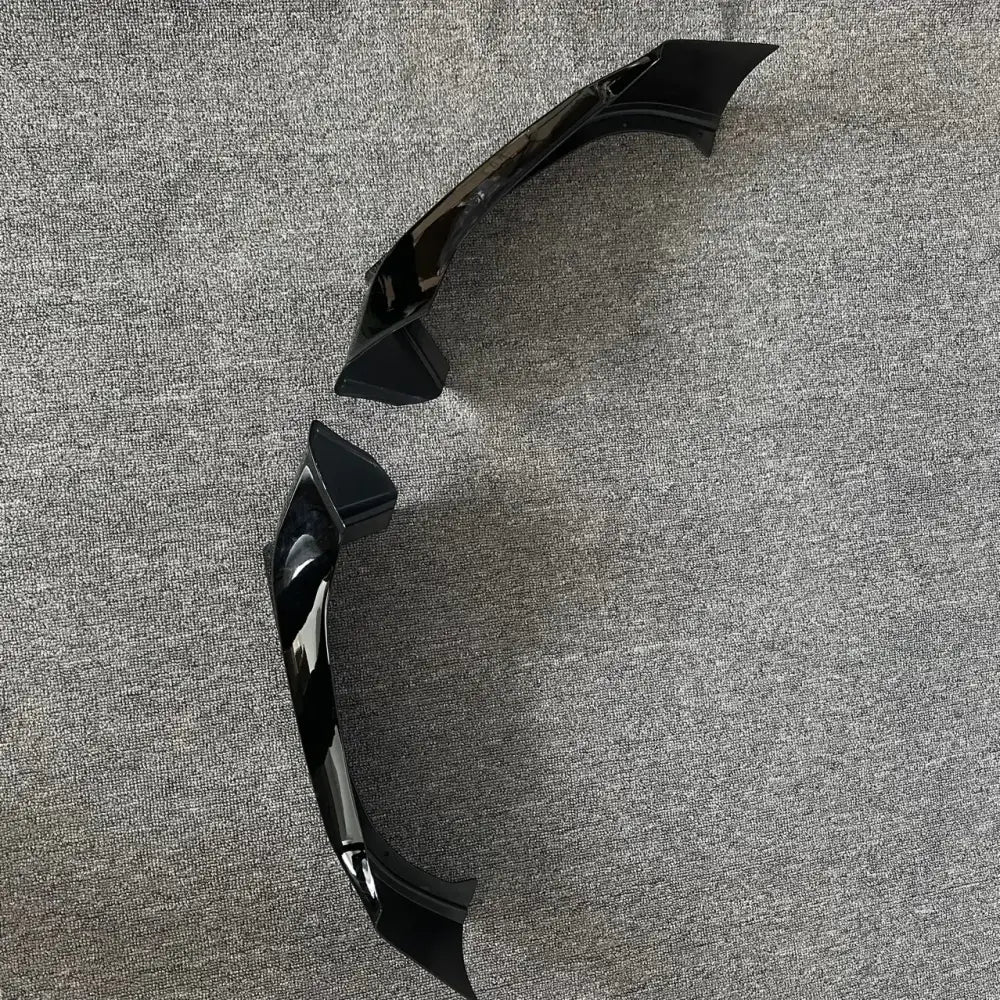 Black glossy plastic side mirror housing covers.