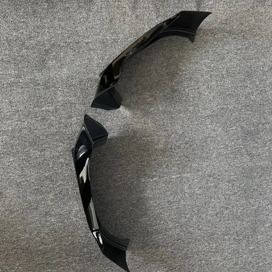 Black glossy plastic side mirror housing covers.