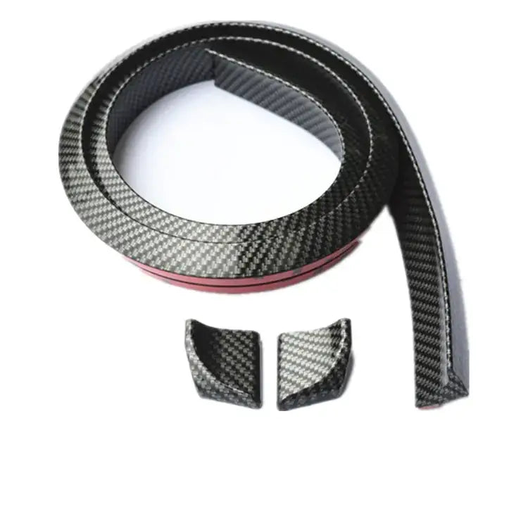 Black carbon fiber car trim strip with two matching corner pieces.
