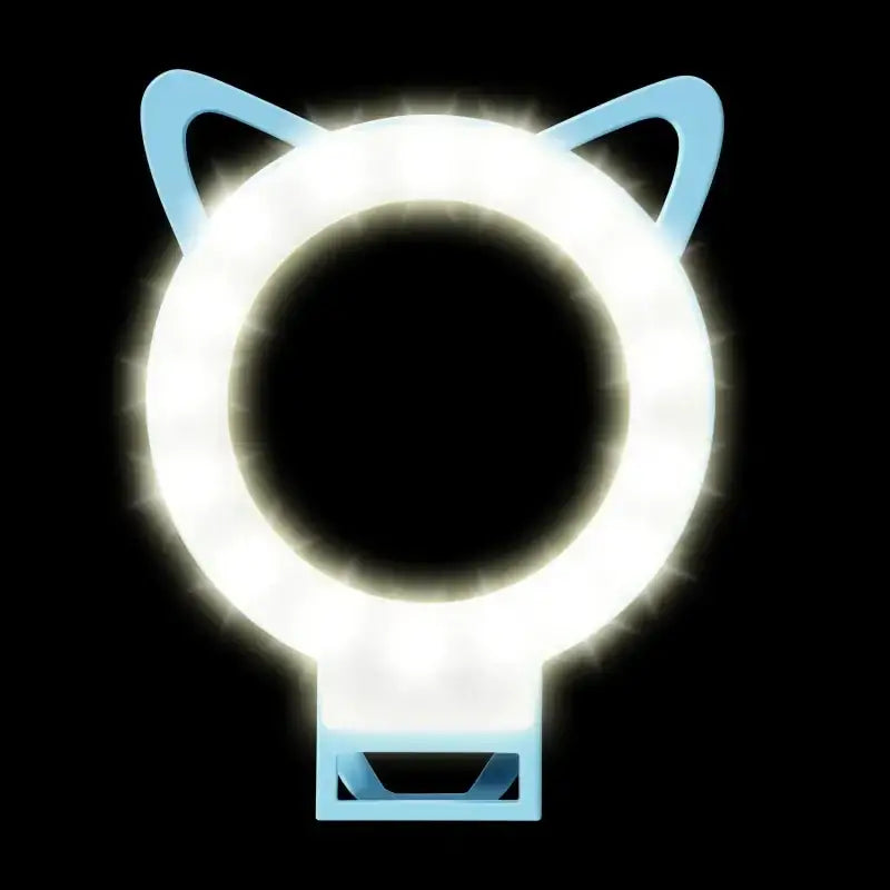 A glowing light ring with cat ears, featuring a bright white illumination and a sleek blue plastic frame.