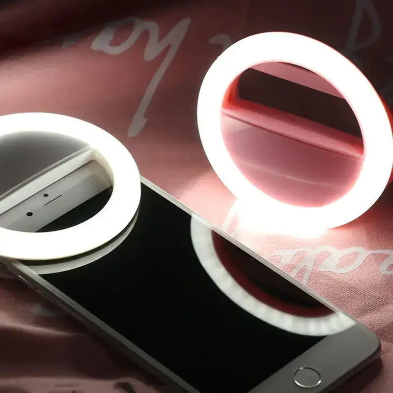White circular ring light with led illumination and a built-in mirror