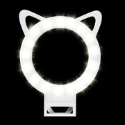 White cat-ear shaped ring light with led bulbs glowing brightly around its circular frame.