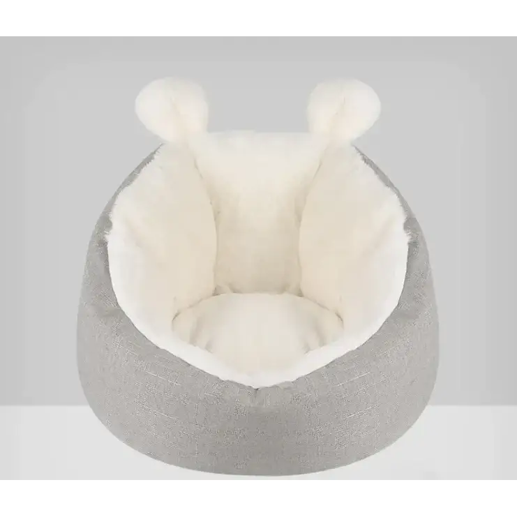 Gray and cream plush pet bed with soft, fluffy ears.