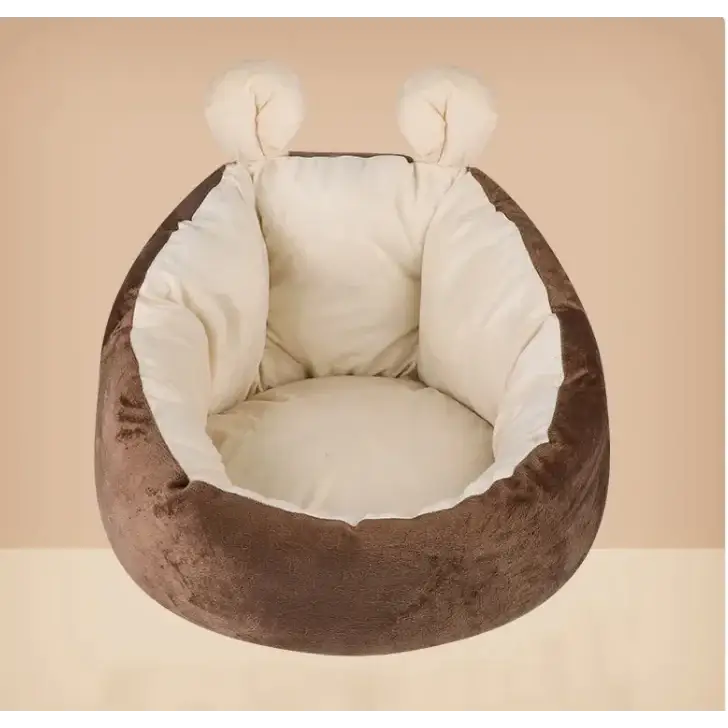 Brown plush pet bed with soft white inner lining and adorable rounded ear accents.