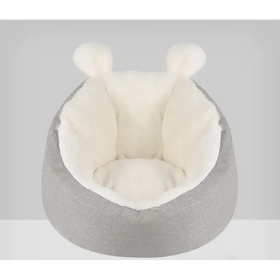 Gray and cream plush pet bed with soft, fluffy ears.