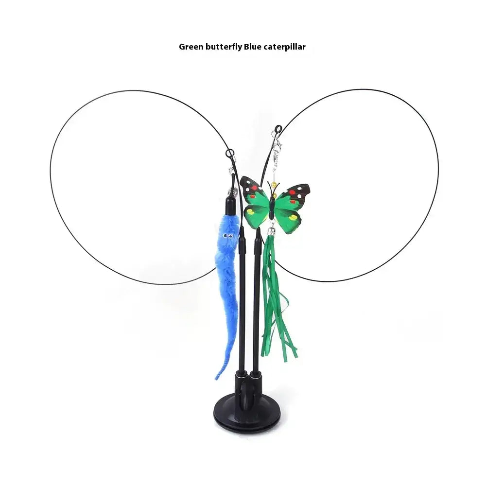 Green butterfly and blue caterpillar cat toy with feather and tassel attachments on black metal stands.