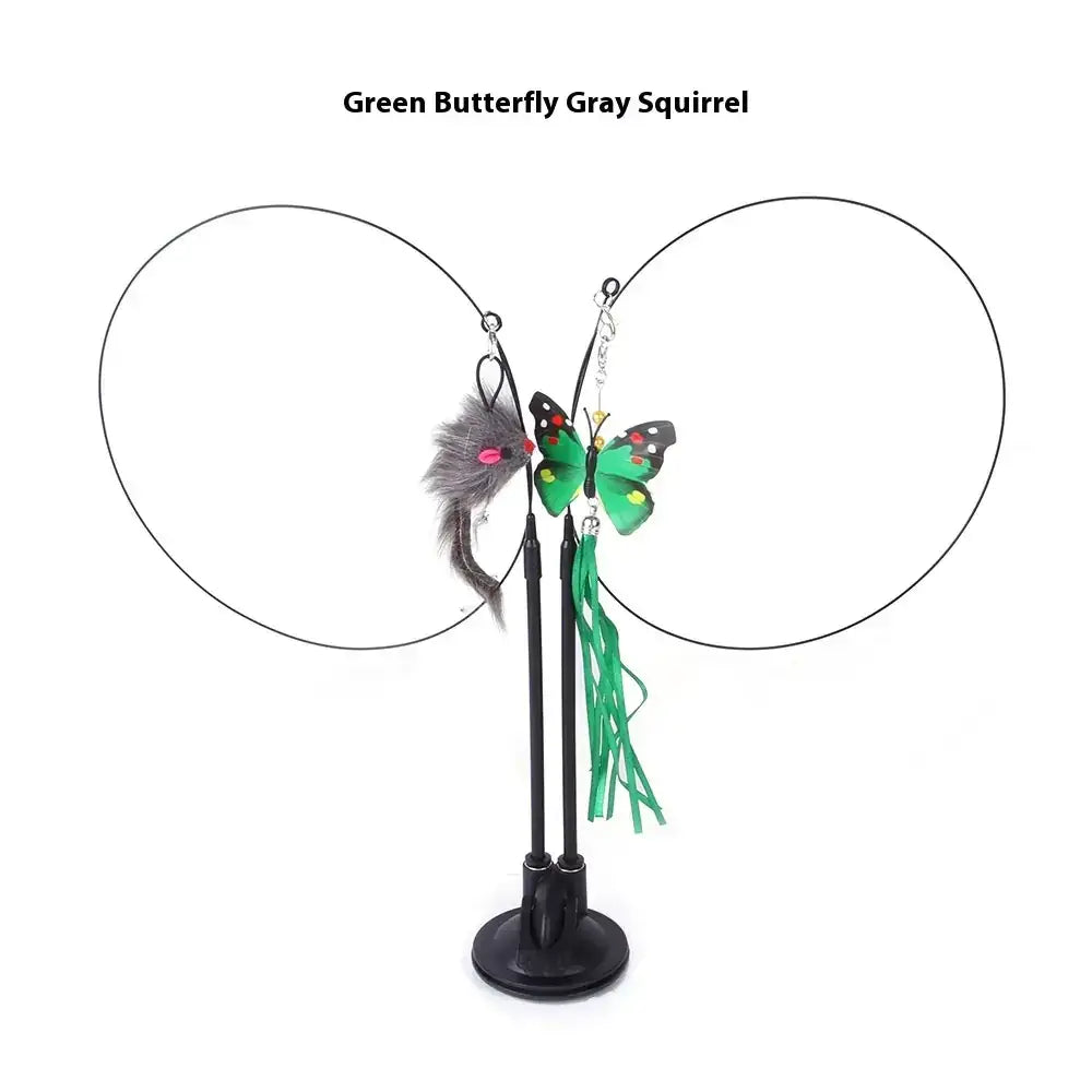 Green butterfly and gray squirrel cat toy with dangling feathers on a black stand.