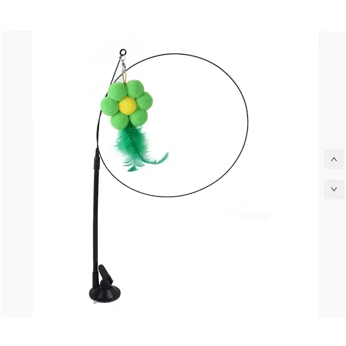 Green and yellow plush flower cat toy with green feathers hanging from a black adjustable stand.