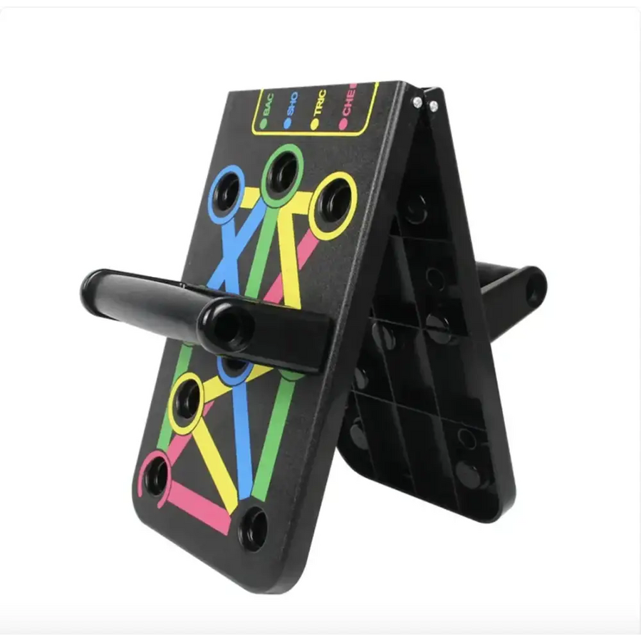 Black plastic push-up workout board with colorful neon-colored exercise guide lines and labeled muscle groups.