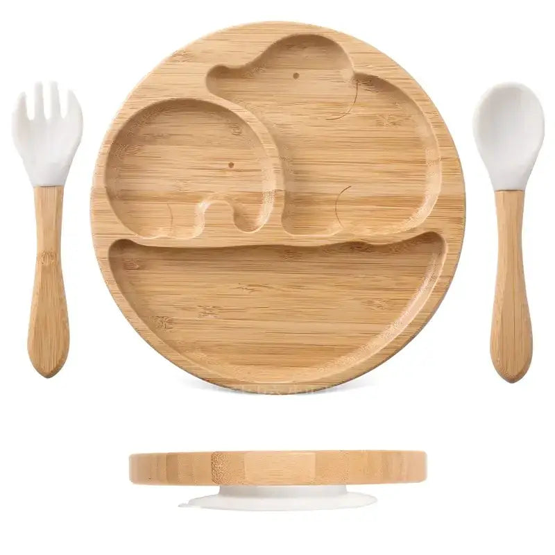 Bamboo elephant-shaped baby plate with three compartments and matching bamboo utensils.