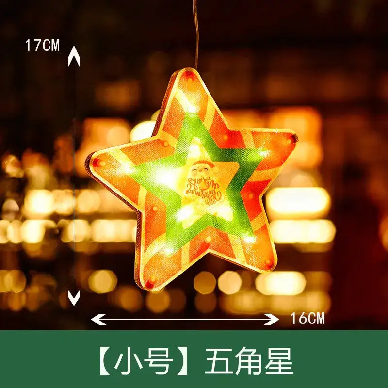 A glowing, five-pointed star-shaped christmas ornament with a red and green striped pattern and an illuminated center featuring santa claus.