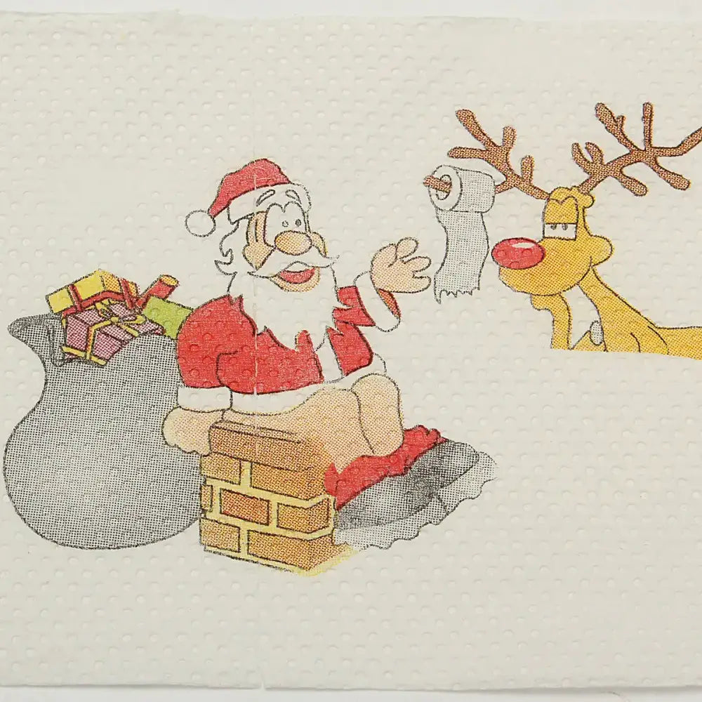A festive christmas-themed paper napkin featuring a cartoon santa claus in his traditional red suit and hat, sitting on a brick chimney with a sack of gifts beside him, while a yellow reindeer with antlers and a red nose holds up a roll of