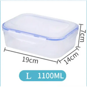 Clear rectangular glass food storage container with a matching lid featuring blue sealing edges and labeled as 1100ml capacity.