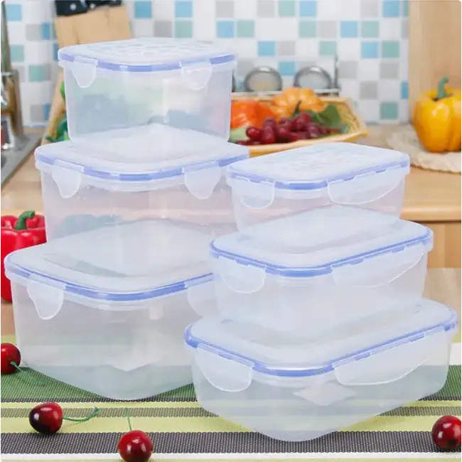 Set of clear plastic food storage containers with blue sealing edges and snap-on lids.