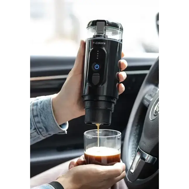 Black t-colors portable electric coffee maker with transparent reservoir and blue power button.