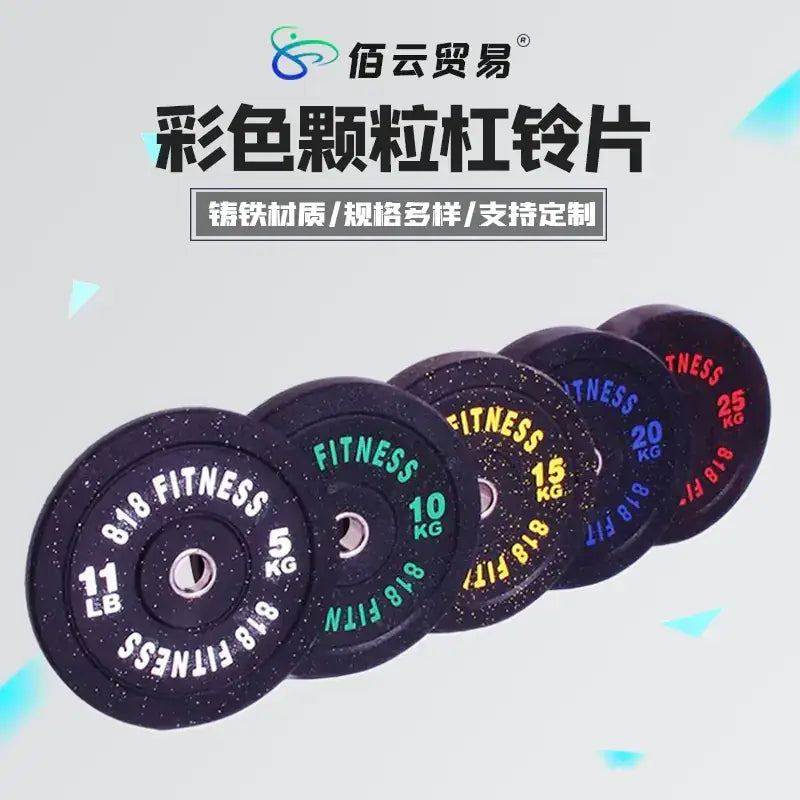 Black speckled rubber weight plates with colorful ’fitness’ branding and weight markings in multiple languages.