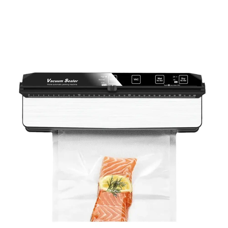 Black and white home vacuum sealer with digital controls sealing a salmon fillet in clear plastic.