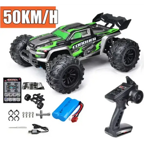 Green and black remote-controlled off-road truck with rugged tires and a ’conquer’ logo on the side.