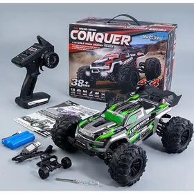 Green and black 1/16 scale rc off-road truck with rugged tires, detailed bodywork, and a ’conquer’ logo on the side.