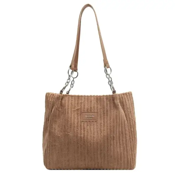 Tan corduroy shoulder bag with a chain-link strap and a small leather patch on the front.