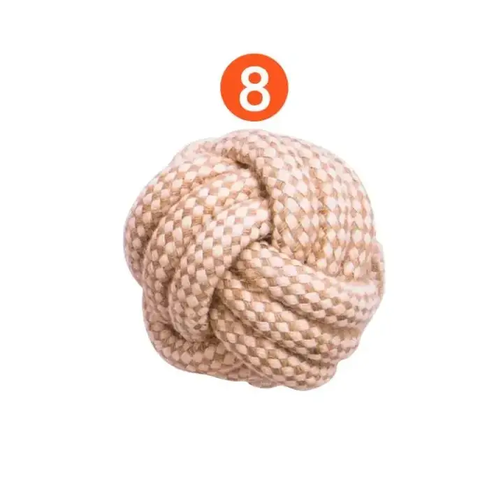 A beige rope knot toy with a textured, woven pattern.