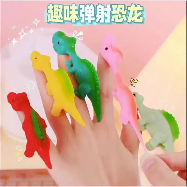 Colorful silicone dinosaur finger toys in red, yellow, green, pink, and light green.