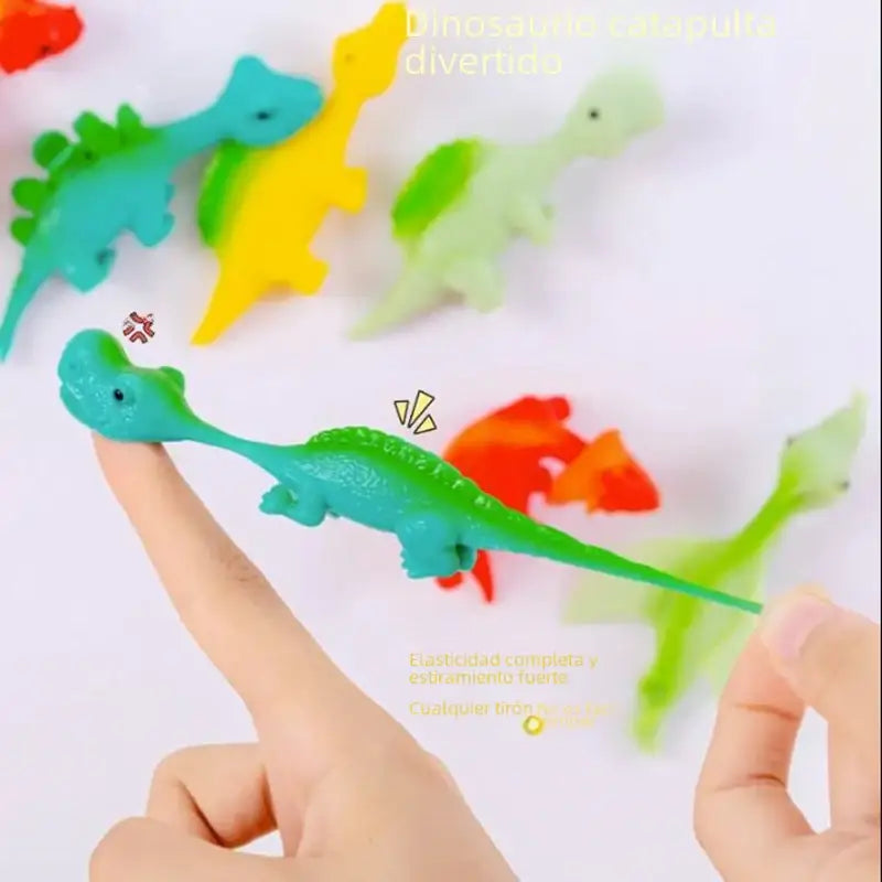 A teal and green stretchy dinosaur toy with a long neck, textured back ridges, and small black eyes.